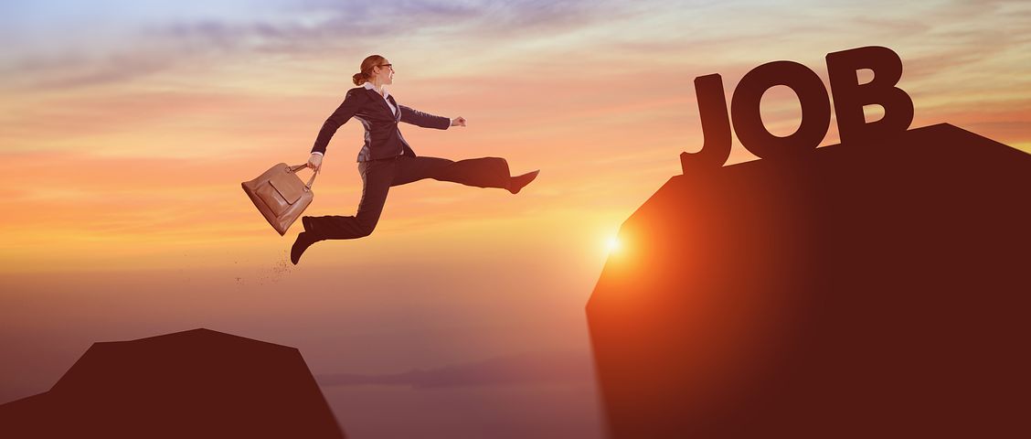 women in formal wear flying towards letter 'Job'