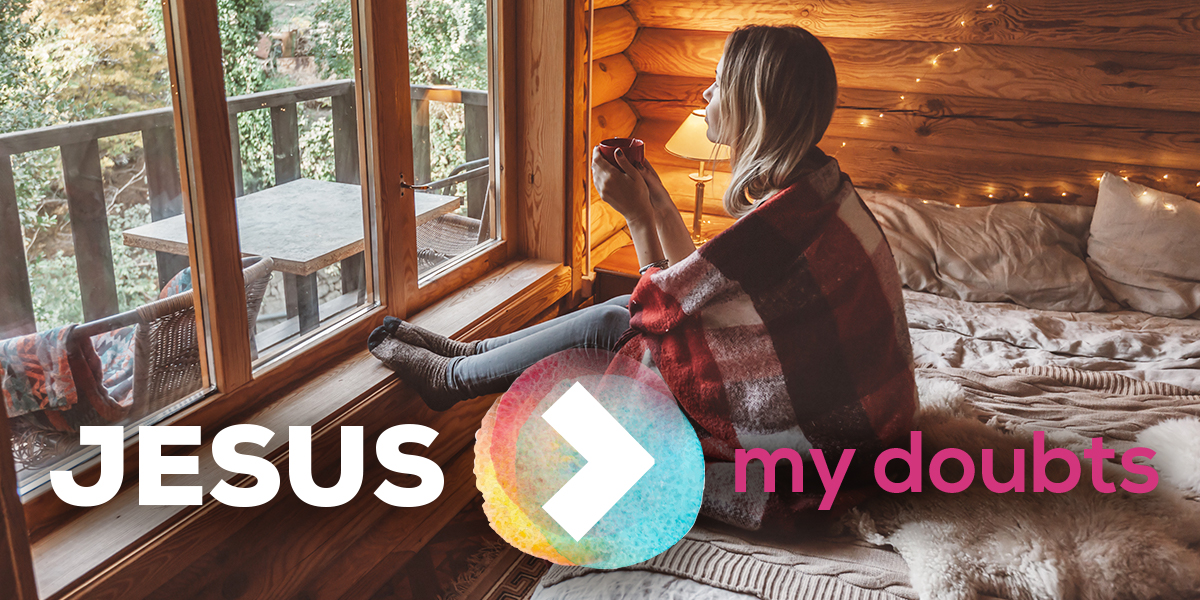 Woman drinking a hot mug. "Jesus > My Doubts"