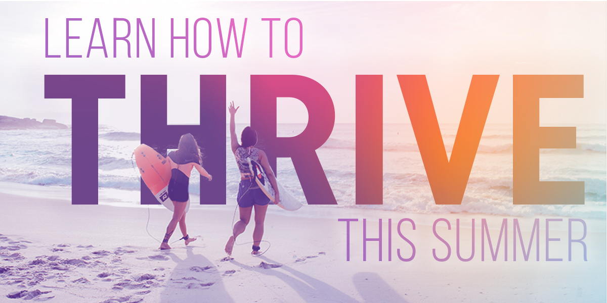 2 woman on beach with surfboards. "Learn How To Thrive This Summer"