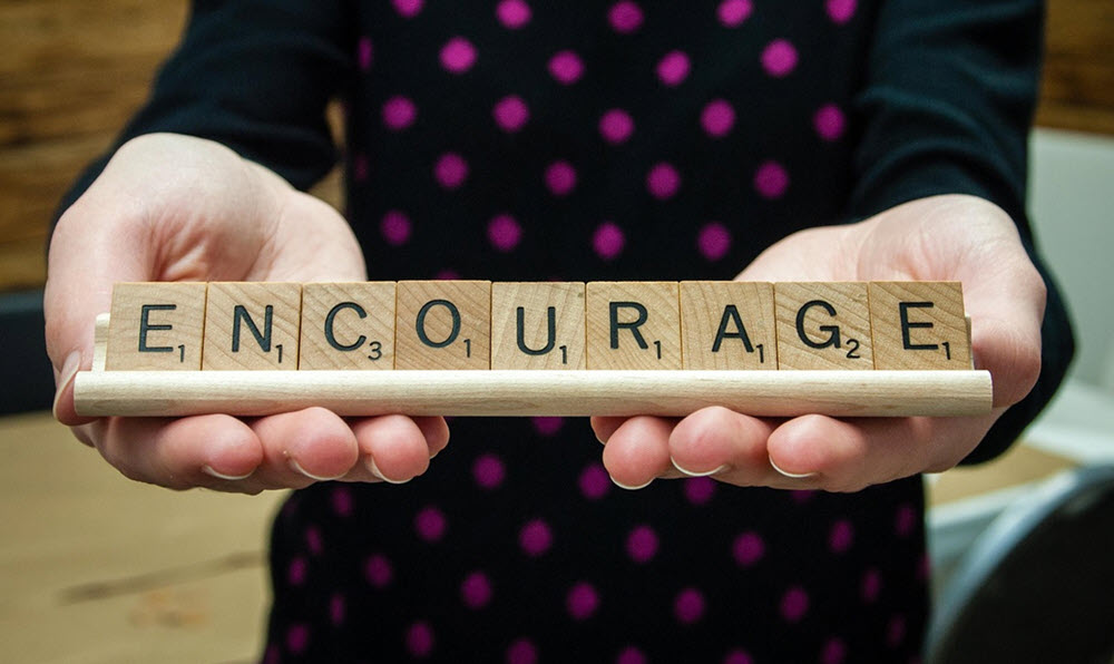 Encourage letters in wooden blocks