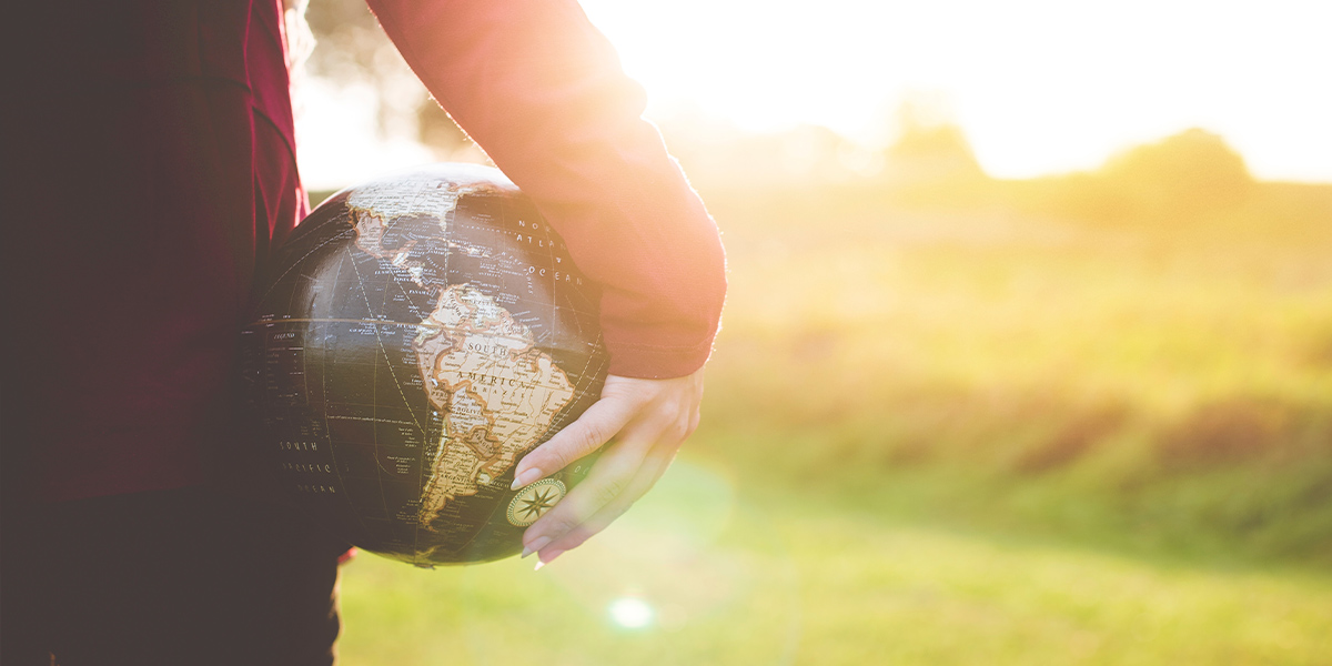 man holding earth ball