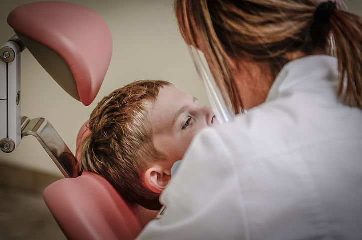 Dentist with a kid