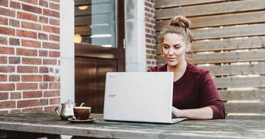woman using laptop computer