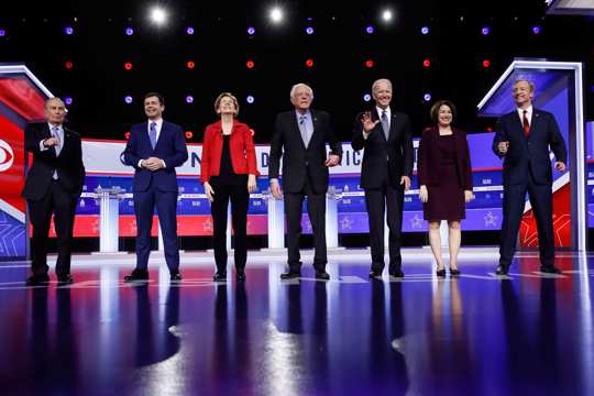 From left, Democratic presidential candidates, former New York City Mayor Mike Bloomberg, former South Bend Mayor Pete Buttigieg, Sen. Elizabeth Warren, D-Mass., Sen. Bernie Sanders, I-Vt., former Vice President Joe Biden, Sen. Amy Klobuchar, D-Minn., and businessman Tom Steyer stand on stage before a Democratic presidential primary debate