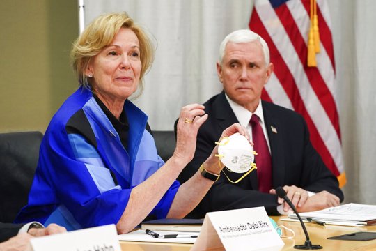 Dr. Deborah Birx, Ambassador and White House coronavirus response coordinator, holds a 3M N95 mask