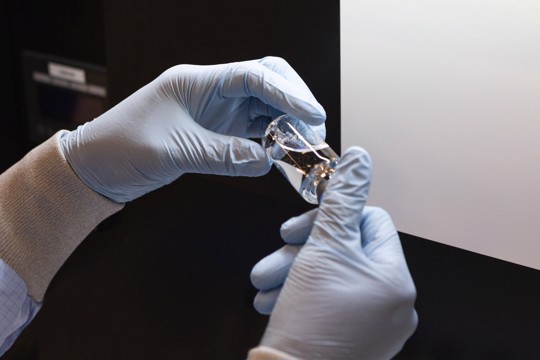 Vial of the experimental drug remdesivir visually inspected