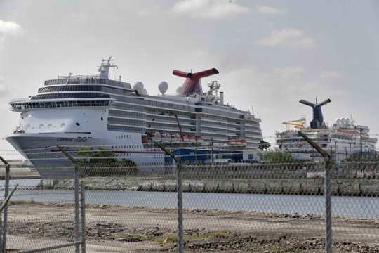Carnival Cruise ships are docked at the Port of Tampa in Tampa, Fla.