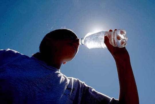 Heat - Man Drinking Water