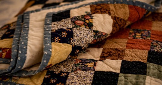 Quilt with various patches of color