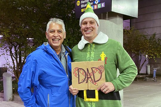 man dressed as Buddy the Elf