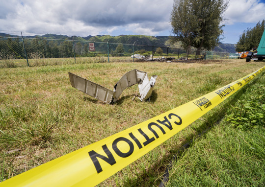 pieces of airplane after crash