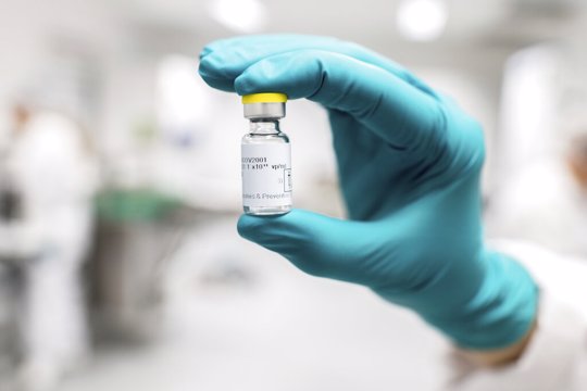 Person holding vial of the Janssen COVID-19 vaccine