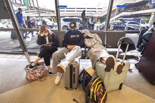 people waiting at airport