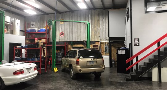 God's Garage repair shop with cars
