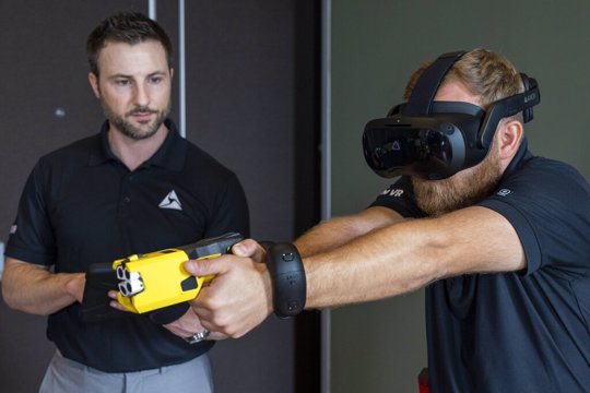VR equipment and a version of the TASER 7 that utilizes VR technology for training, is demonstrated