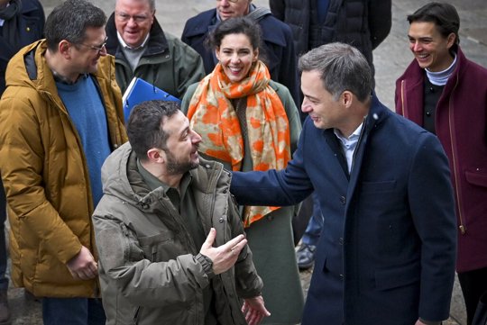 In this photo provided by the Ukrainian Presidential Press Office, Ukrainian President Volodymyr Zelenskyy, front left, speaks with Belgian Prime Minister Alexander De Croo .