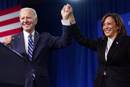 President Joe Biden and Vice President Kamala Harris stand on stage at the Democratic National Committee winter meeting, Feb. 3, 2023, in Philadelphia. A majority of Democrats now think one term is plenty for Biden, despite his insistence that he plans to seek reelection in 2024. That's according to a new poll from The Associated Press-NORC Center for Public Affairs Research.