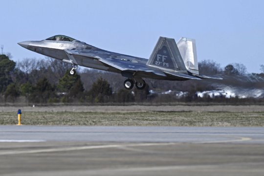 This photo provided by the U.S. Air Force shows a U.S. Air Force pilot taking off in an F-22 Raptor at Joint Base Langley-Eustis, Va., Saturday, Feb. 4, 2023. At the direction President Joe Biden, military aircraft brought down a high altitude surveillance balloon off the coast of South Carolina.