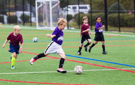 Boys playing soccer