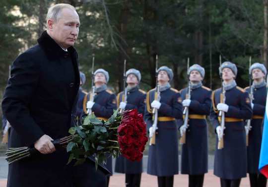 President Vladimir Putin attends a wreath laying commemoration ceremony for the 77th anniversary since the Leningrad siege was lifted during the World War Two at the Boundary Stone monument, around 50 kilometers east of St.Petersburg, Russia, Saturday