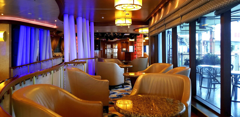 This photo provided by Michele Smith, shows an empty dining center on the Grand Princess cruise ship Friday, March 6, 2020, off the California coast. Scrambling to keep the coronavirus at bay, officials ordered a cruise ship with about 3,500 people aboard to stay back from the California coast until passengers and crew can be tested, after a traveler from its previous voyage died of the disease and at least two others became infected. A Coast Guard helicopter lowered test kits onto the 951-foot (290-meter) Grand Princess by rope as the vessel lay at anchor off Northern California, and authorities said the results would be available on Friday, March 6, 2020. Princess Cruise Lines said fewer than 100 people aboard had been identified for testing.