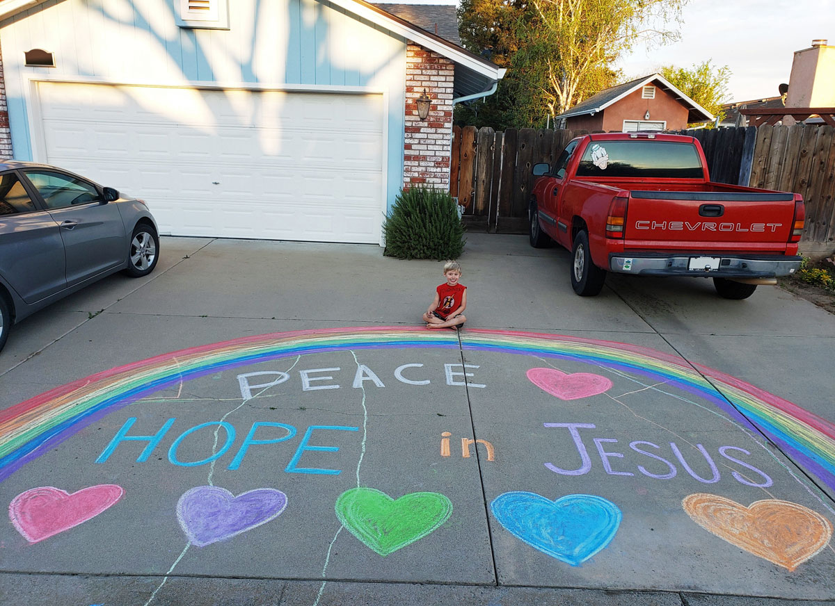 Chalk art lifting up Jesus