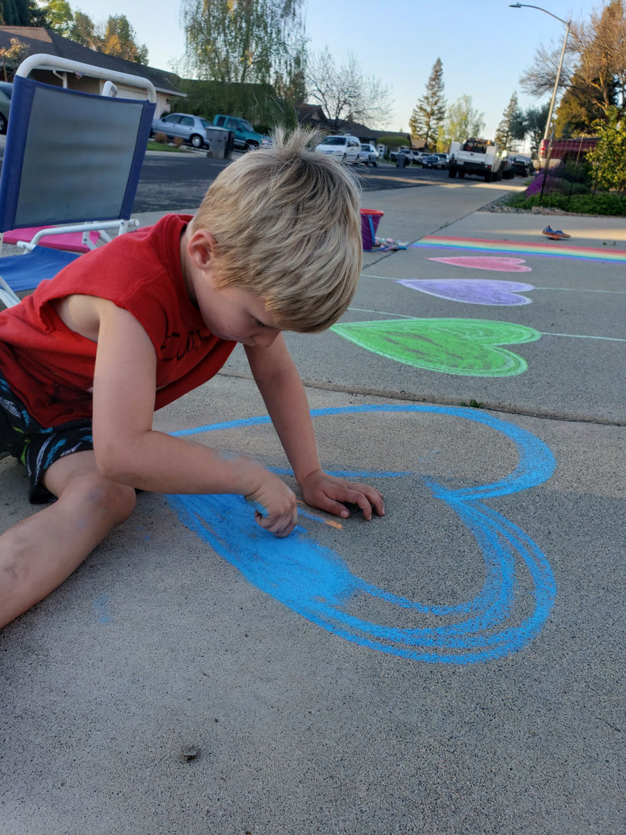 Jesse, doing chalk art