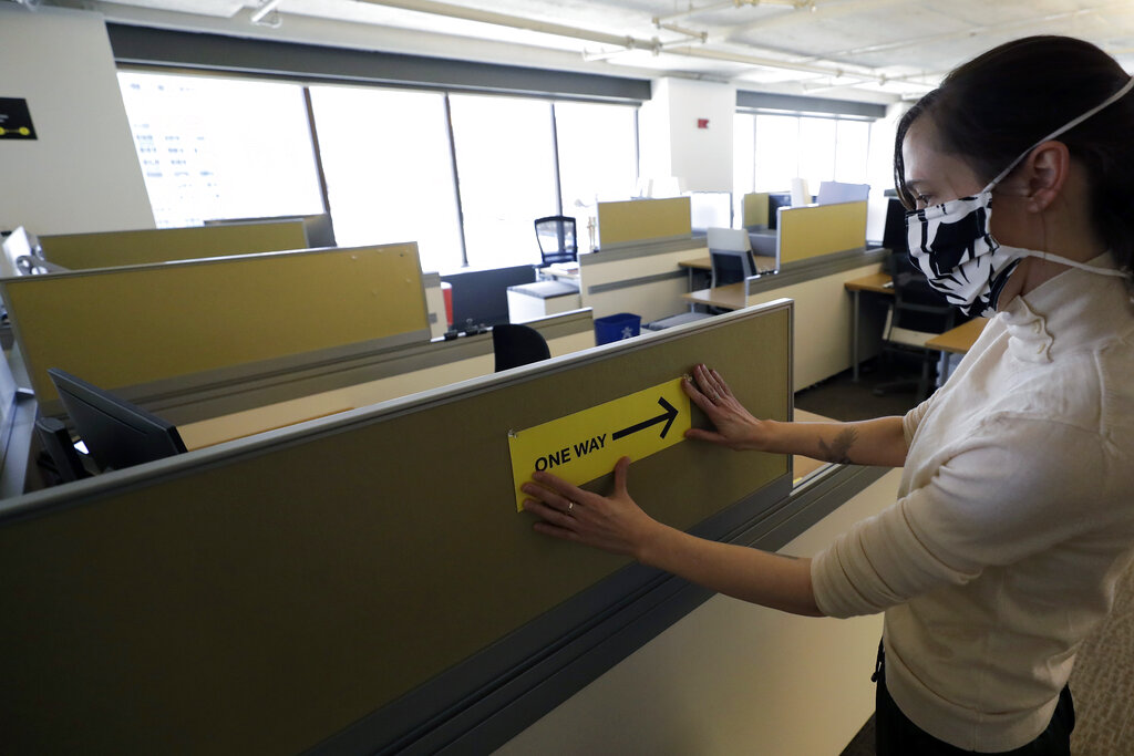 One Way sign to walk to cubicle