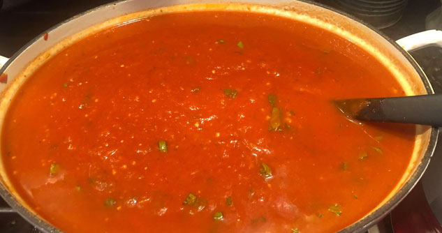 A pan on the stove of homemade meat sauce