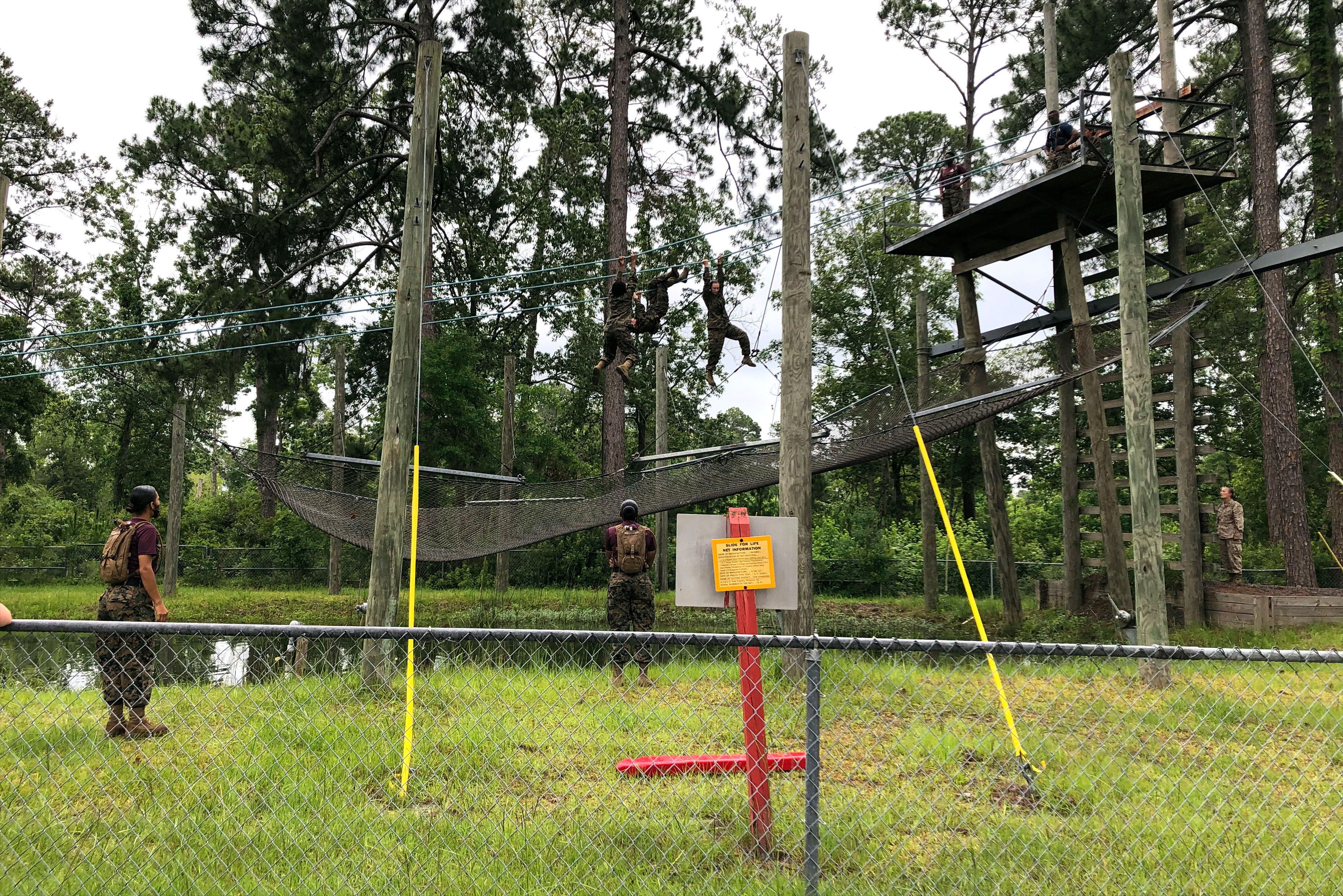 Female Marines go through confidence course