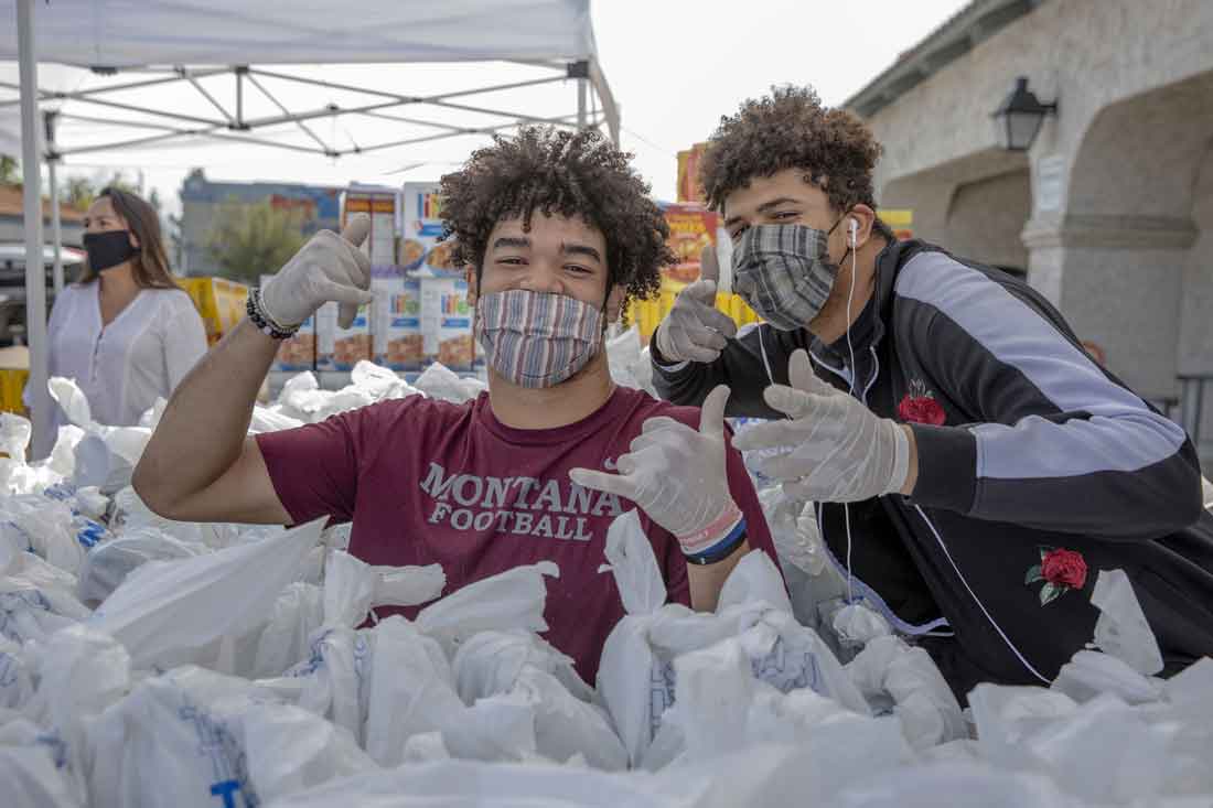 Volunteers prepping food to bless others