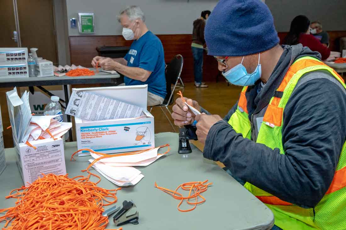 Volunteers repairing N95 masks