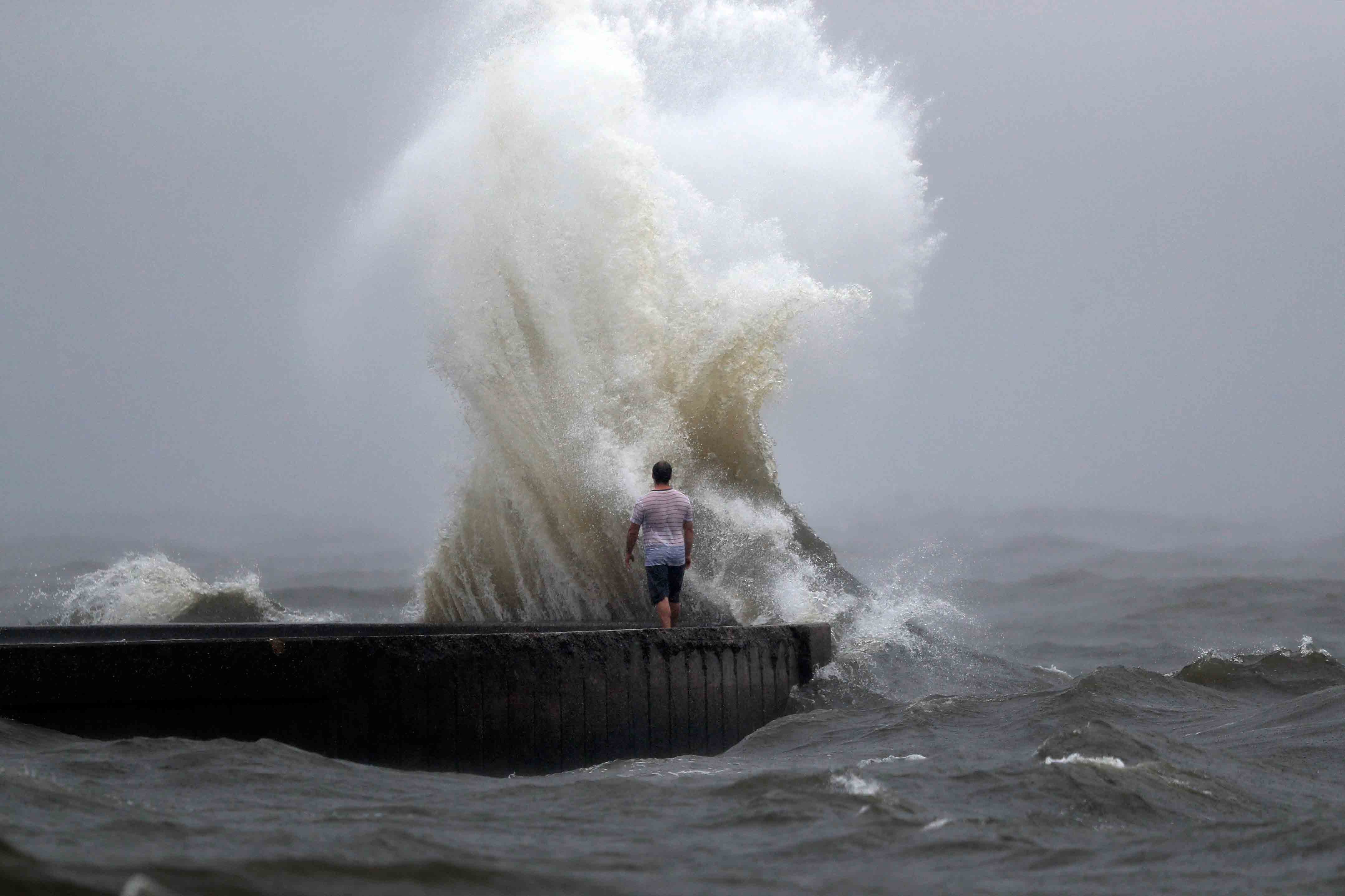 Person watching big wave crash