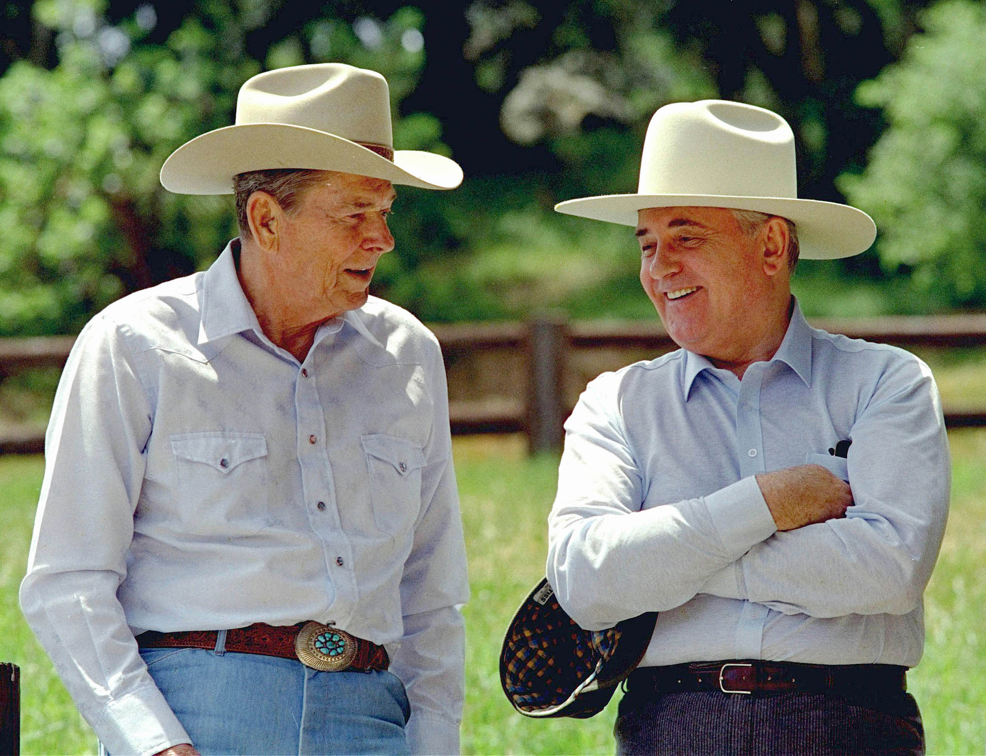 In this May 2, 1992 file photo, former President Ronald Reagan, left, and former Soviet President Mikhail Gorbachev don cowboy hats while enjoying a moment at Reagan