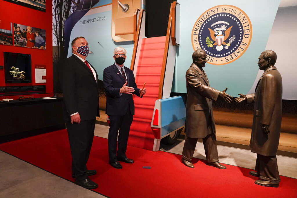 Secretary of State Mike Pompeo, left, tours the Richard Nixon Presidential Library with Hugh Hewitt, president and CEO of the Nixon Foundation