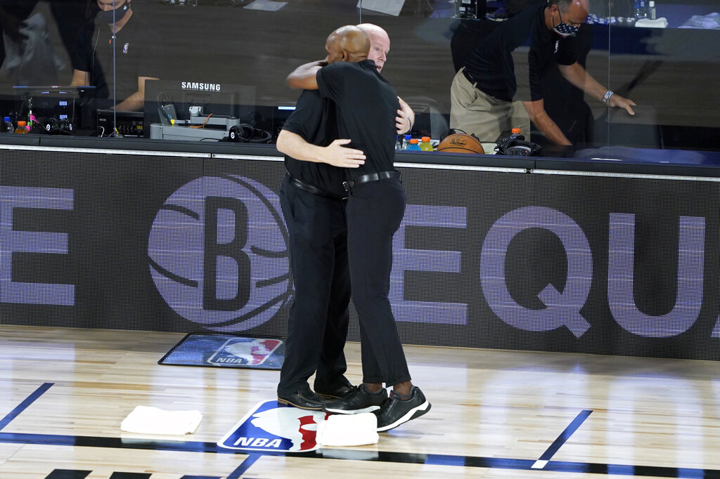 Magic Nets Coaches Hug Before Game, 1 Player Did Not Kneel During 