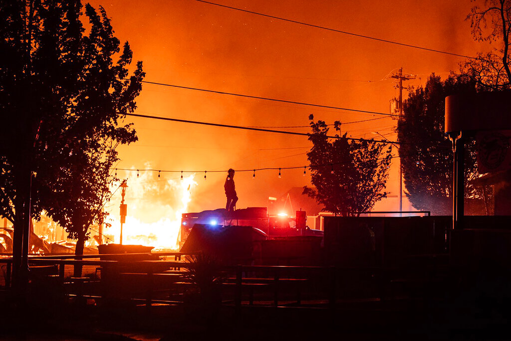 Photo taken by Talent, Ore., resident Kevin Jantzer shows the destruction of his hometown as wildfires ravaged the central Oregon town near Medford