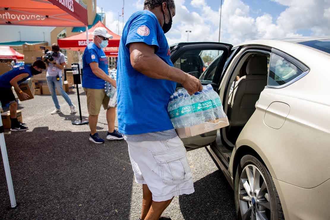 Volunteers blessing those in need