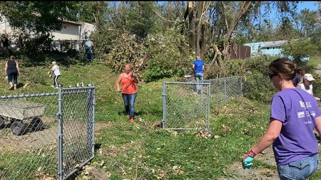 YFC & other volunteers helping with storm damage