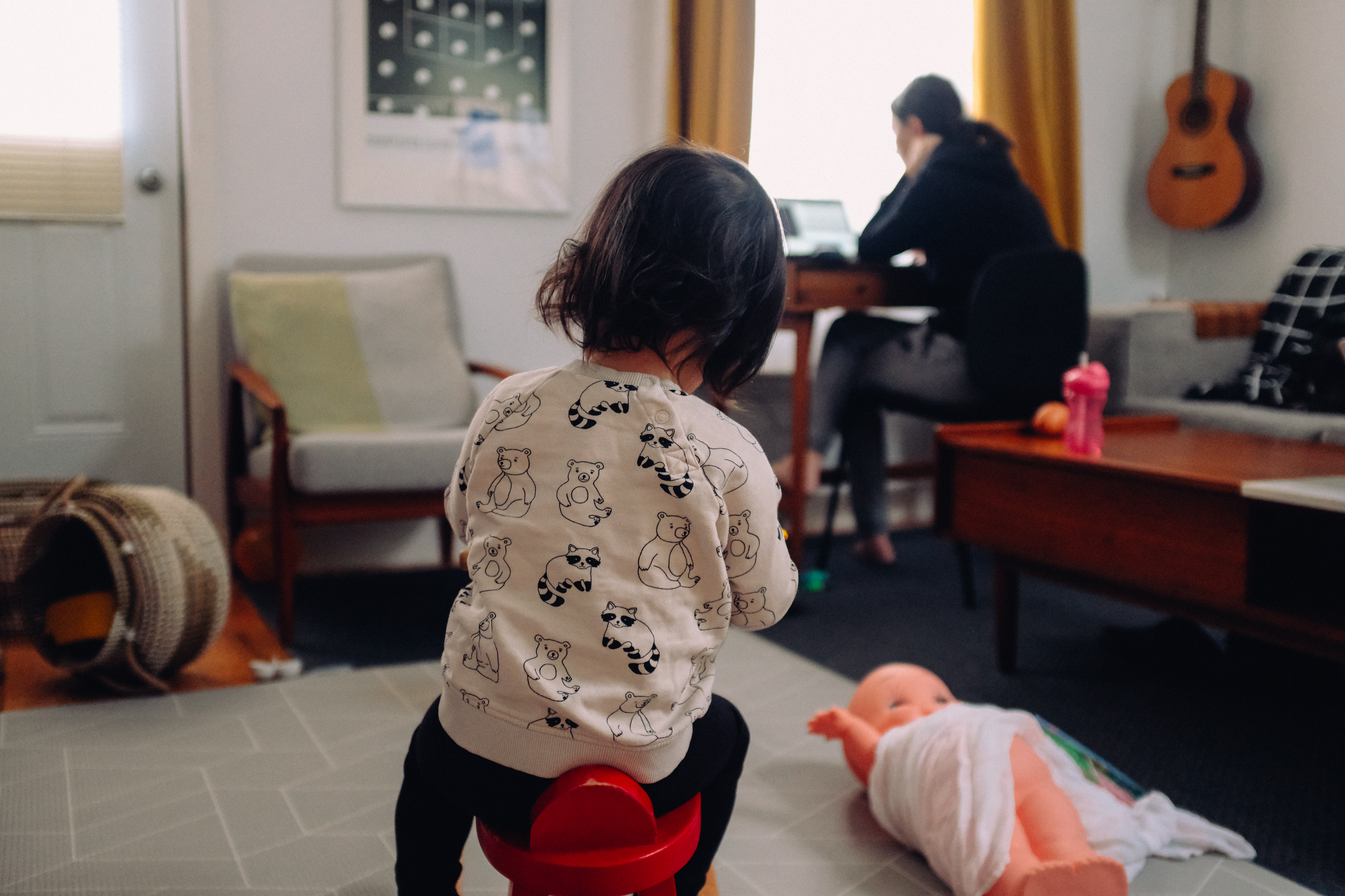 Mom and daughter working from home 