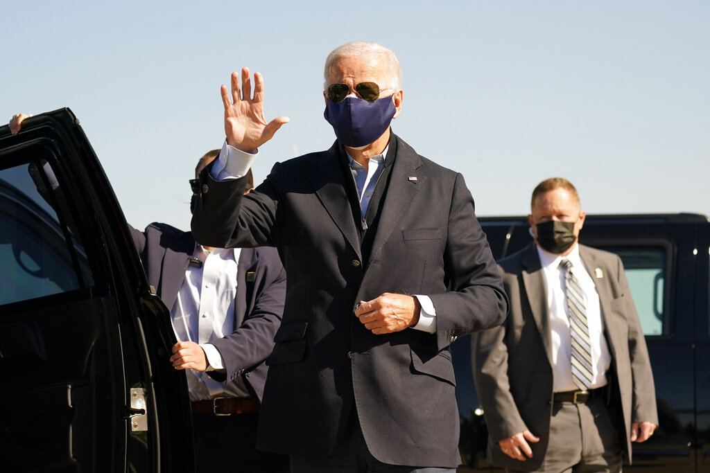 Democratic presidential candidate former Vice President Joe Biden arrives to board his campaign plane at the New Castle Airport in New Castle, Del.