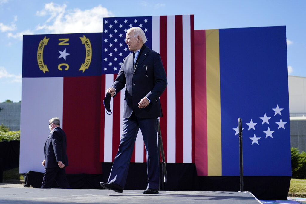 Democratic presidential candidate former Vice President Joe Biden arrives to speak during a campaign event at Riverside High School in Durham, N.C.