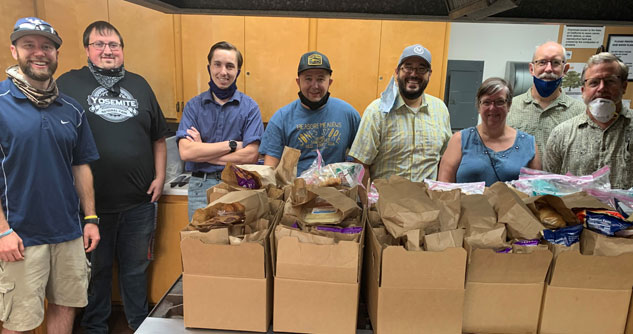 Group of church members packing care packages