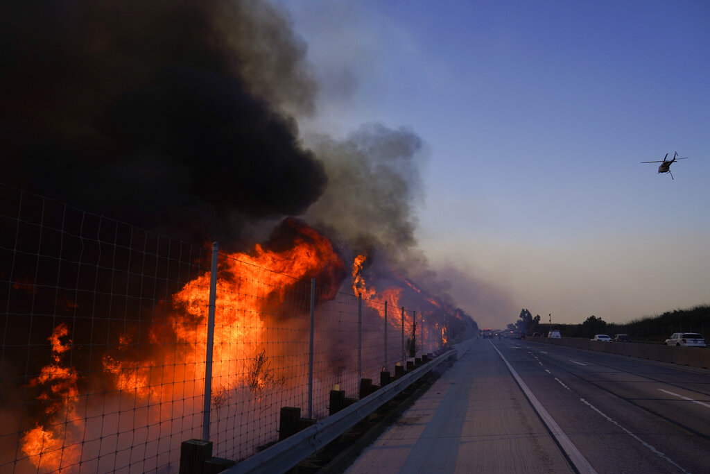 The Blue Ridge Fire burns along the 71 state highway