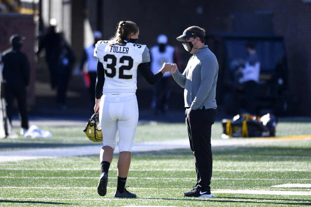 Fuller fist bumps after kick