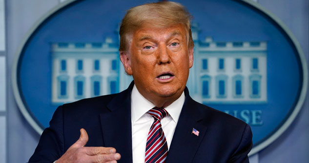 President Trump with a White House logo behind him