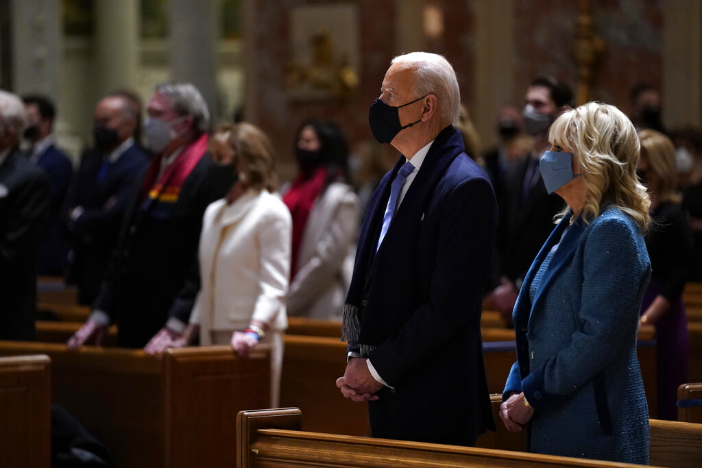 President-elect Joe Biden is joined his wife Jill Biden as they celebrate Mass at the Cathedral of St. Matthew the Apostle during Inauguration Day ceremonies 