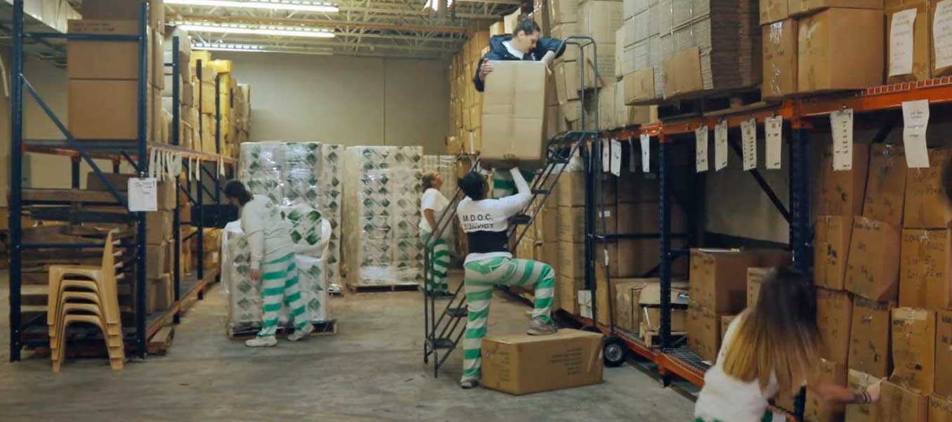Women working in a warehousing facility at a Mississippi Prison