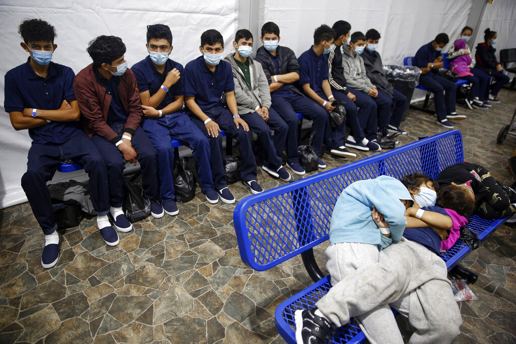 Young unaccompanied migrants wait for their turn at the secondary processing station inside the U.S. Customs and Border Protection facility