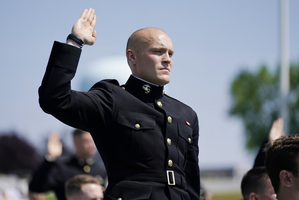 A U.S. Marine Corps pin is seen on the uniform of a graduating U.S. Naval Academy midshipman at the graduation and commission ceremony 